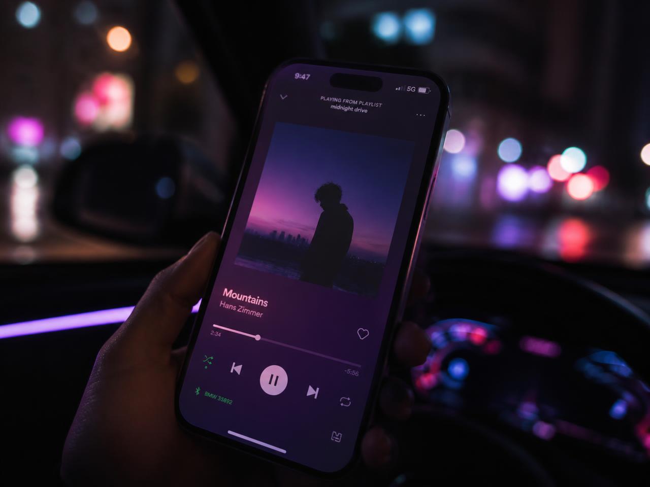 Phone showing the Ride Vibez player inside a car at night
